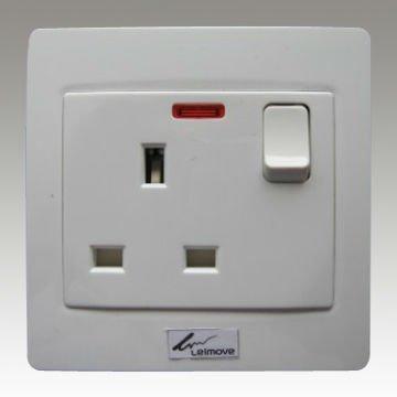England standard three pin socket and small button switch with light